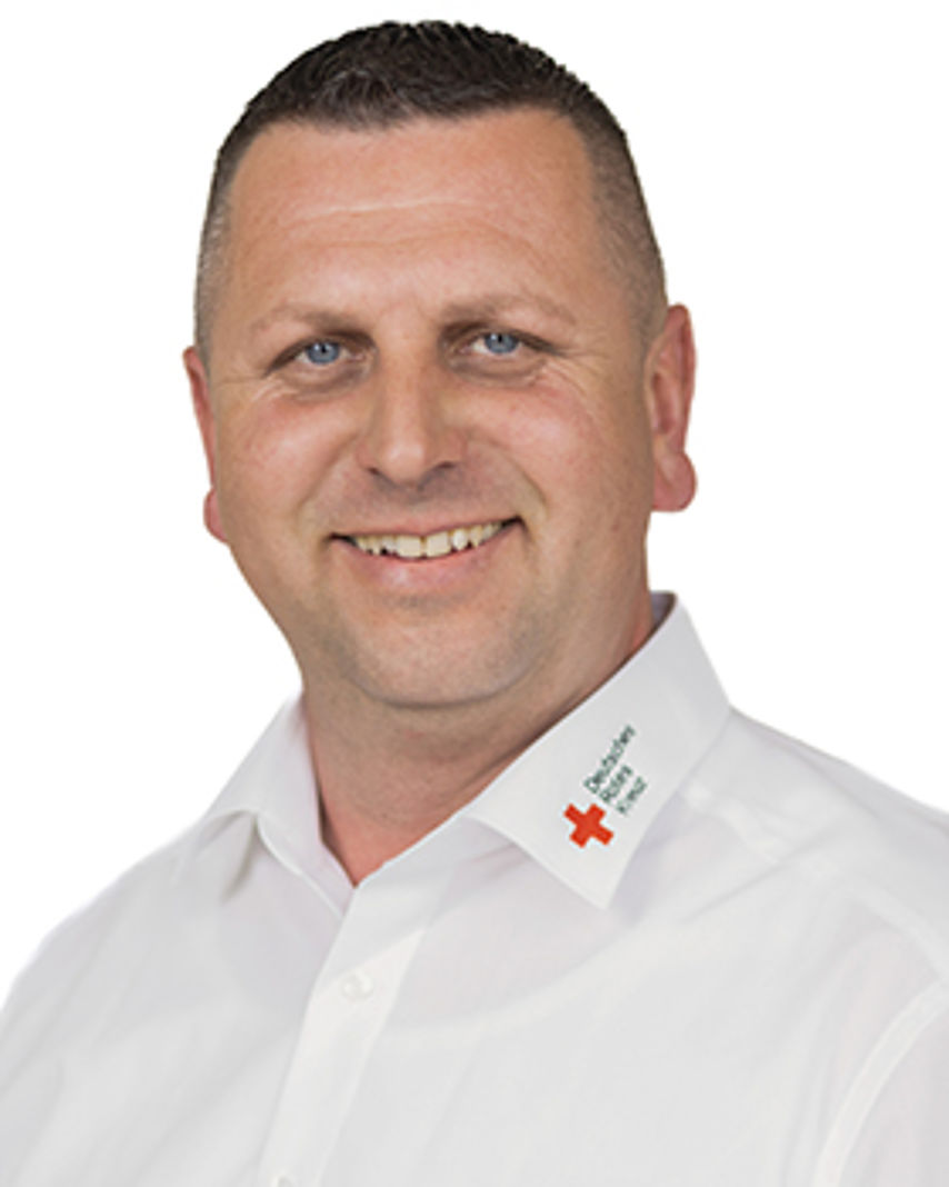 Bild zeigt eine Porträtaufnahme von Herrn Hartmann