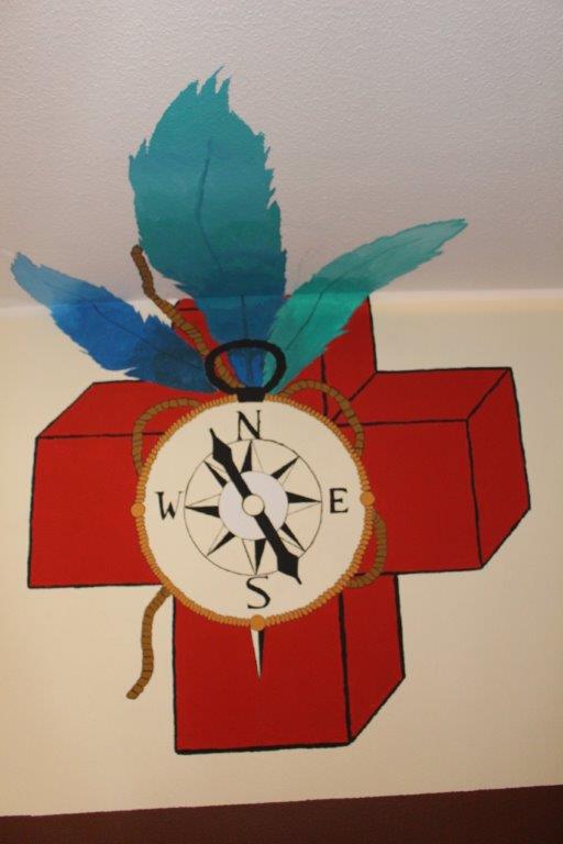 Logo das Logo zeigt einen Kompass vor einem DRK-Kreuz